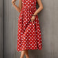 Red midi dress with a floral pattern and breathable fabric.