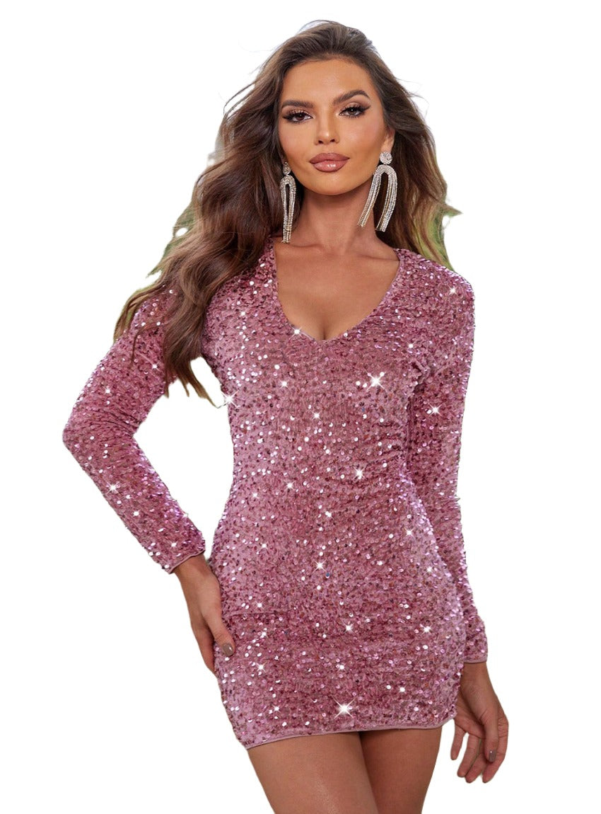 Shine in our Sequin V-Neck Dress, perfect for evenings out. Available in royal blue and dusty pink to make a statement at any event.