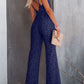 Elegant lace jumpsuit with V-neck and spaghetti straps in white, black, navy, and wine. Perfect for versatile, stylish comfort.
