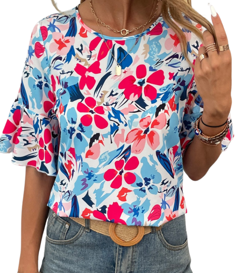 Flaunt style with our Printed Blouse featuring flounce sleeves, a round neck, and vibrant hues perfect for any occasion. Shop now!