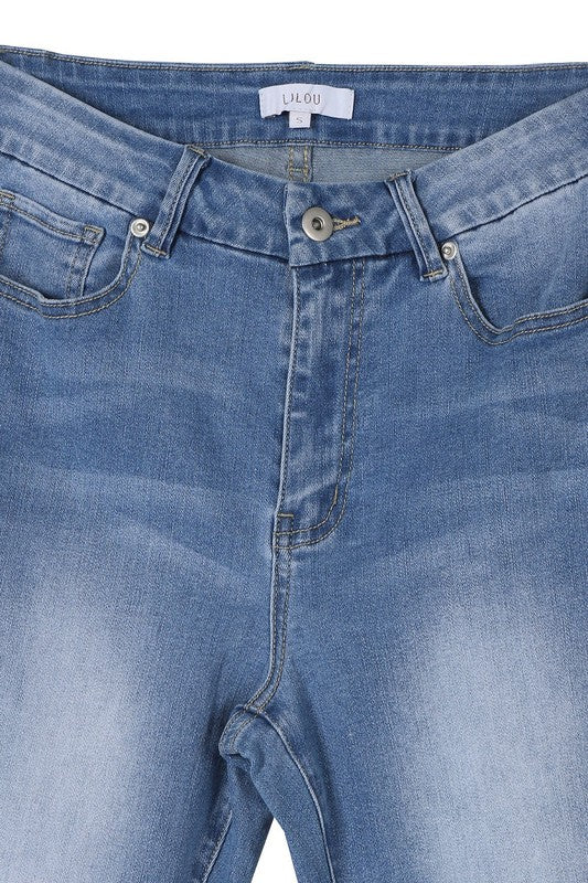 Vintage-inspired mid-rise flare jeans in light blue.