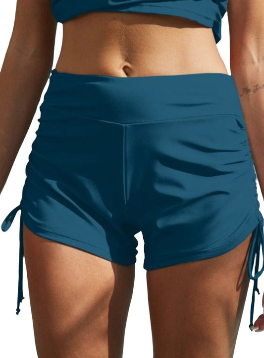 Chic mid-rise swim shorts with adjustable drawstrings, quick-dry fabric, in black and French blue—perfect blend of style and comfort.