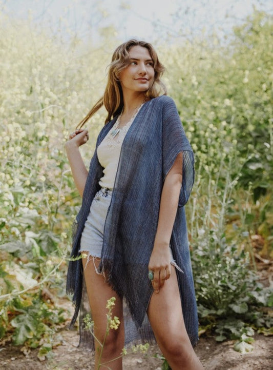 Vibrant blue sheer kimono with flowy fit.