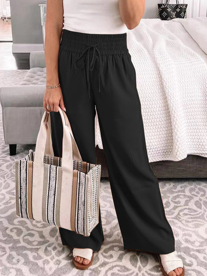 Wide-leg pants with an elastic waistband and drawstring in a variety of colors.