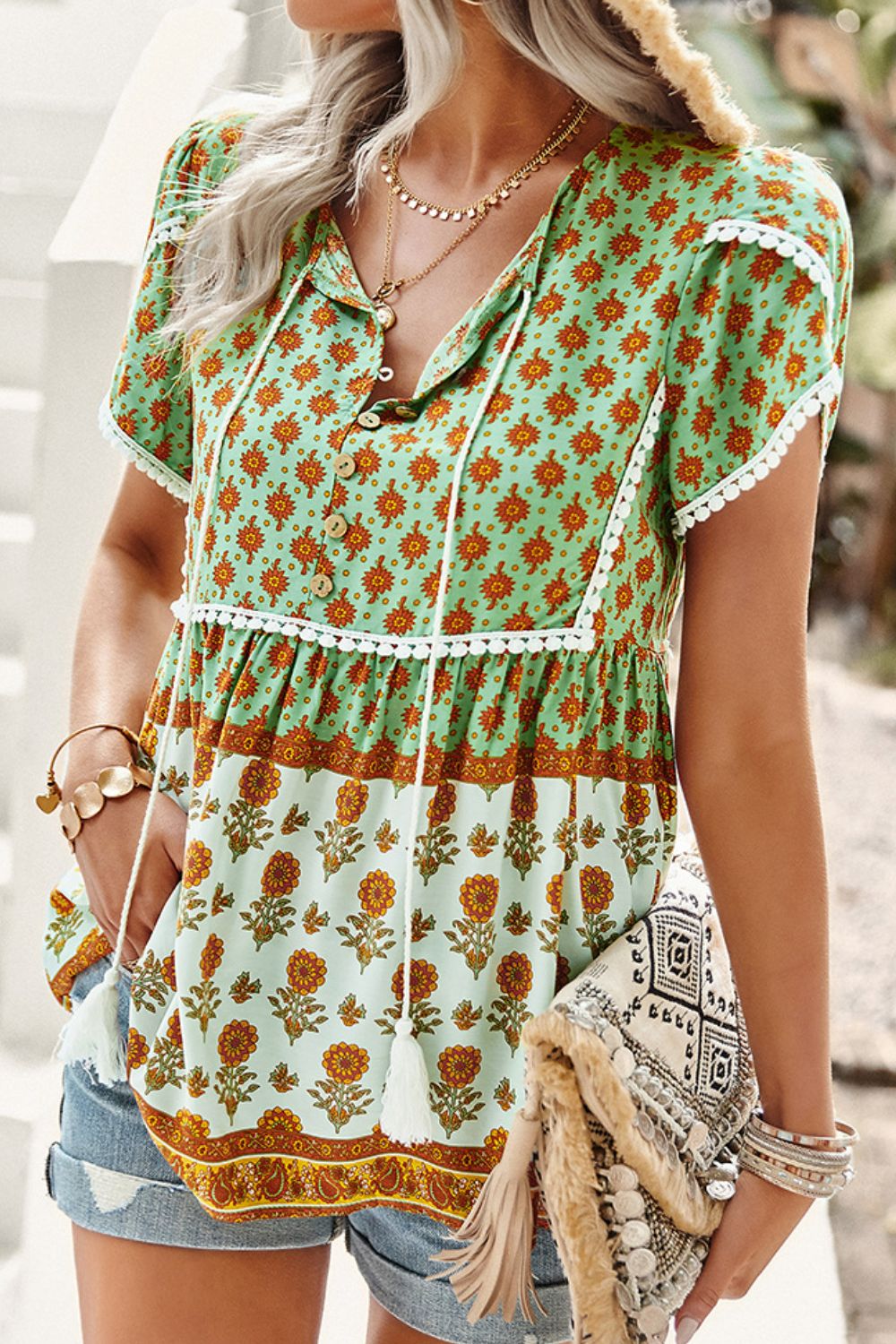 Short sleeve floral babydoll blouse in green and orange