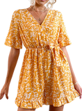 Embrace summer vibes with this chic marigold romper featuring a surplice neckline, ruffled hem, and a comfy elastic waist. Perfect for any outing