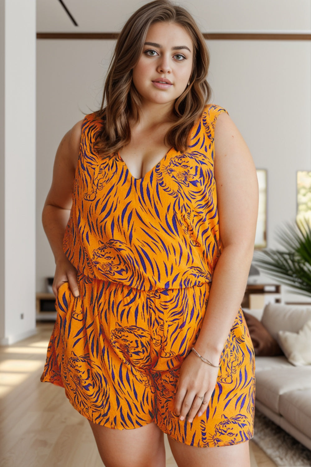 Turn heads in this bold Plus Size Tiger Print Romper. Perfect V-neck fit for a stunning, confident look. Shop now and let your style roar!