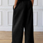 Comfortable black lounge pants with two deep side pockets.