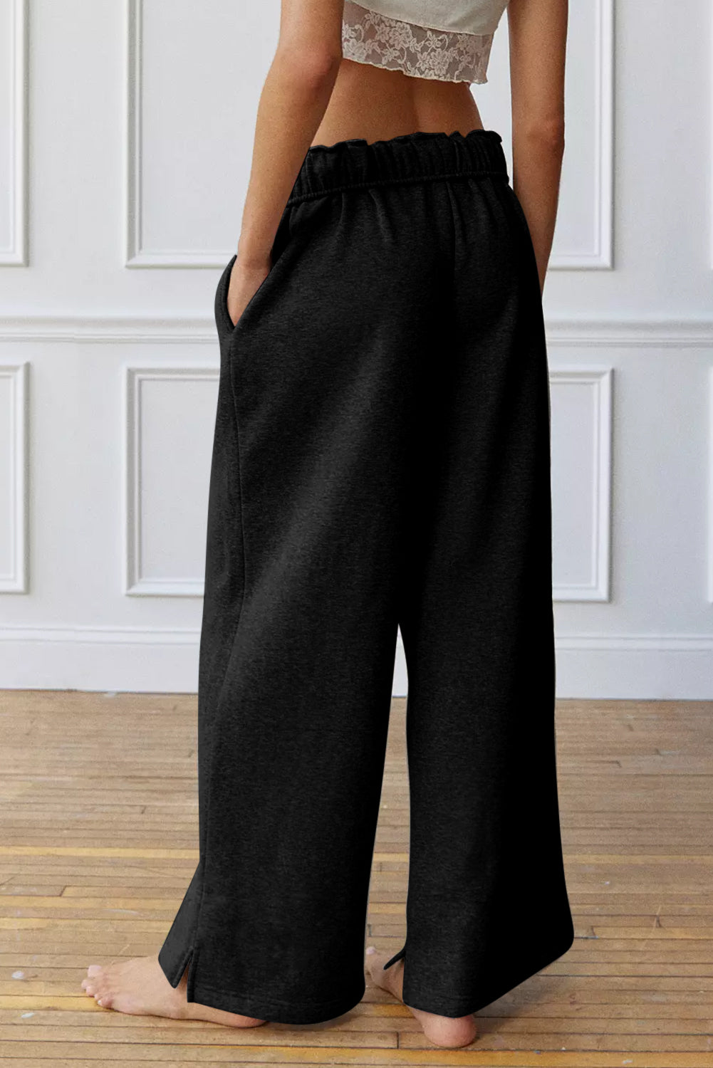 Comfortable black lounge pants with two deep side pockets.