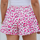 Step out in style with our vibrant pink leopard print shorts, perfect for a chic yet comfortable look this summer.