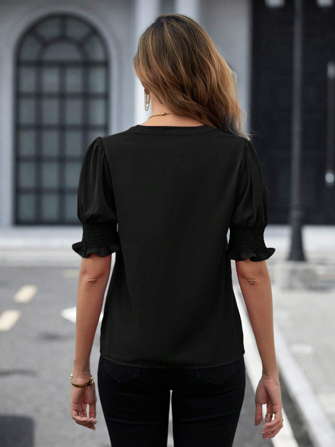Black notched short sleeve blouse with smocked sleeves