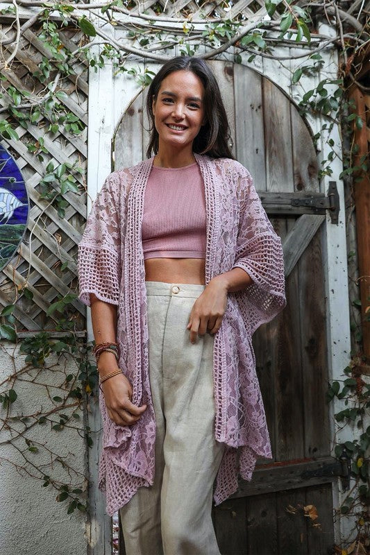 Lightweight knit kimono featuring delicate lace patterns
