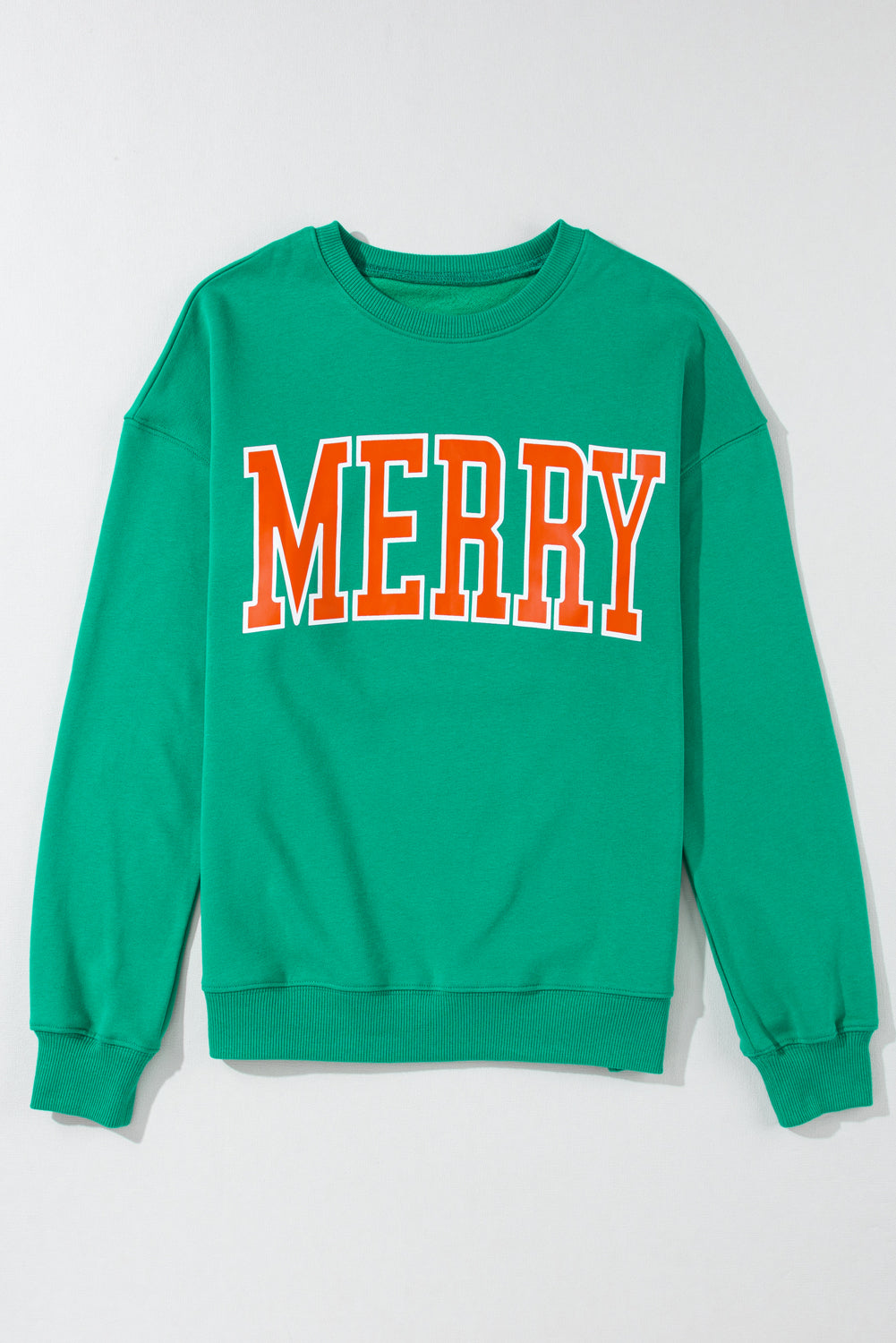 Relaxed fit green sweatshirt with Merry lettering, ideal for festive occasions.
