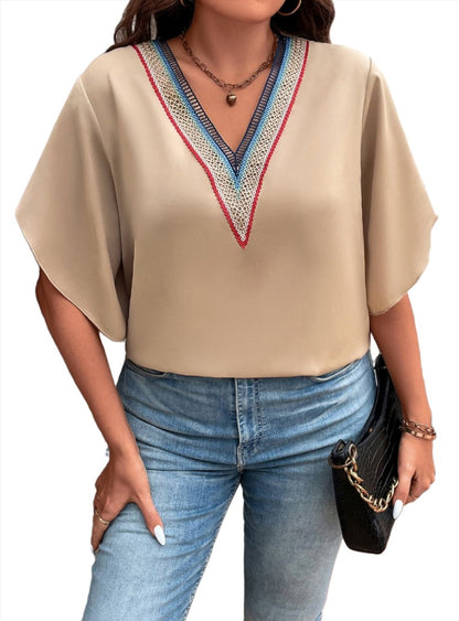 Elegant plus size V-neck blouse with colorful embroidery detail, perfect for casual and dressy occasions