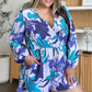 Chic floral romper with pockets, perfect for all-day style and comfort. Versatile, breathable, easy-care. Available in green and blue.