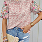 Charming embroidered shirt with ruffled neckline and floral desig