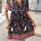 Bohemian style dress with floral print and tassels