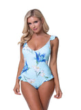 Close-up of a floral one-piece swimsuit with ruffle details, perfect for a stylish beach day.