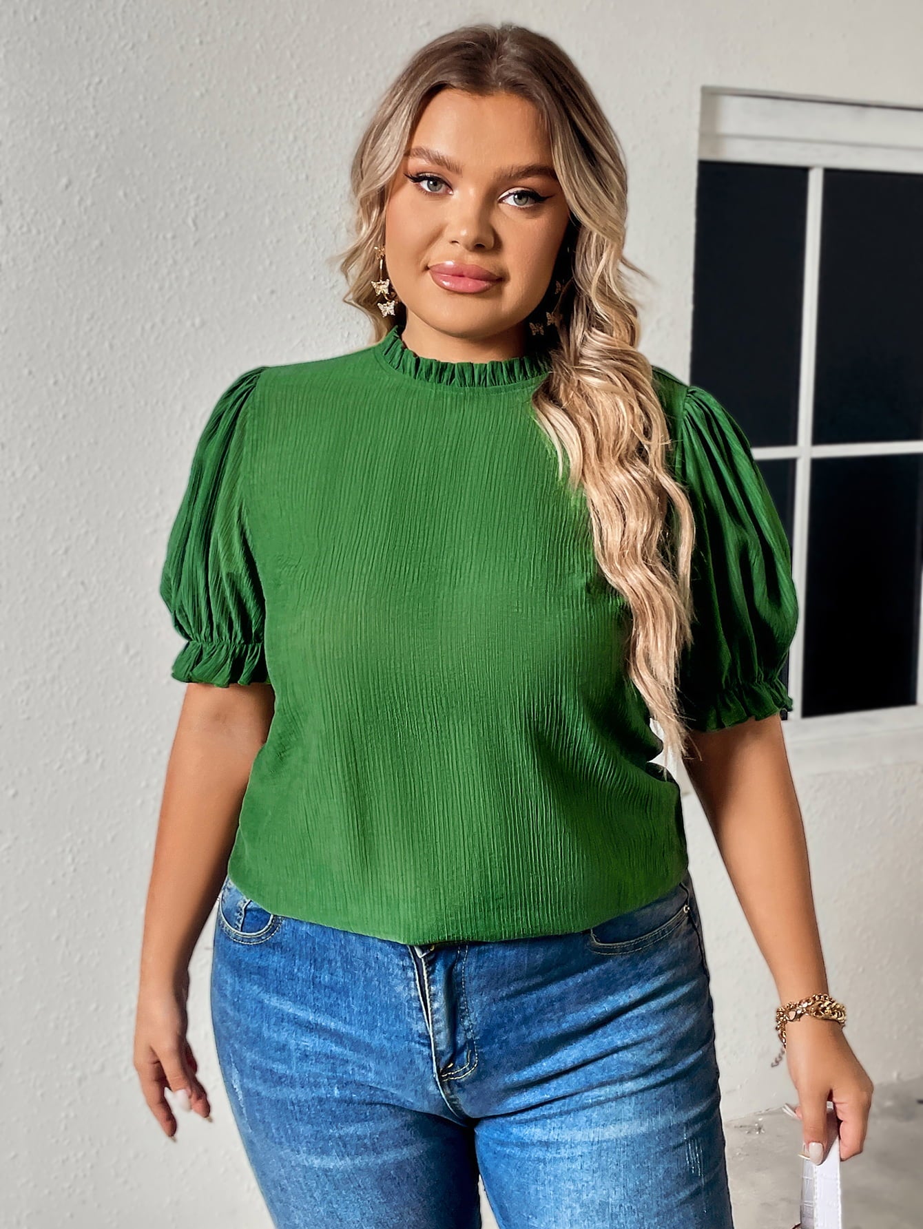 Casual yet chic green blouse perfect for any occasion, paired with jeans