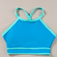 Women's radiant blue bikini with high-waist bottoms and turquoise trim