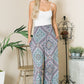 High-waisted pattern pants with functional pockets
