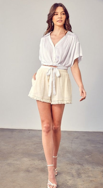 Elegant ivory linen shorts perfect for warm weather