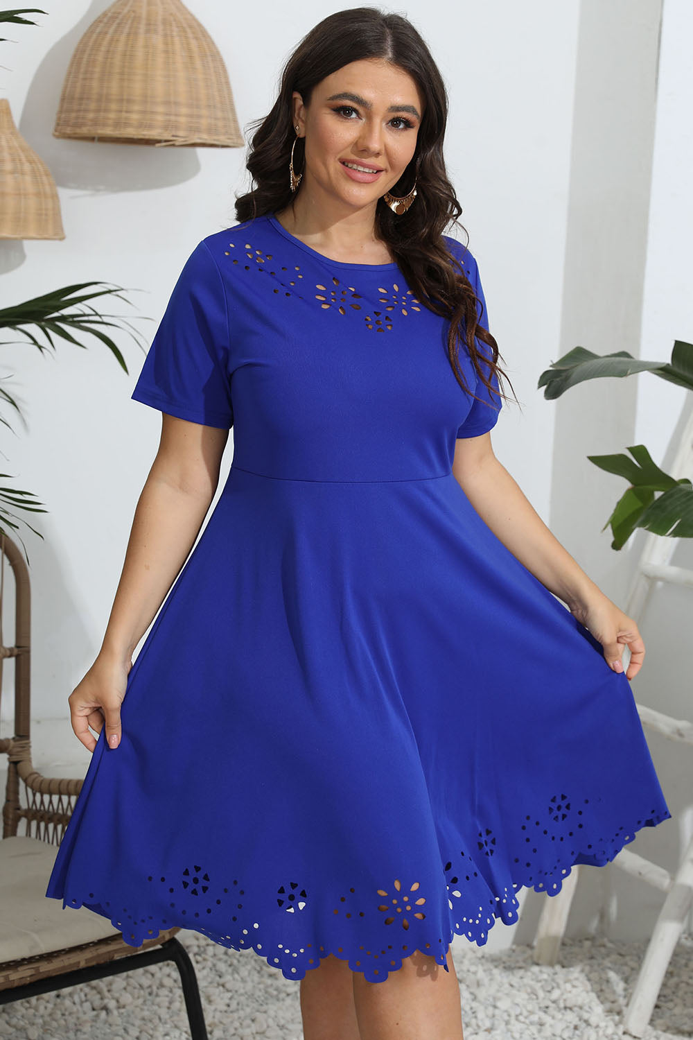 Discover elegance with our Plus Size Dress in red, black, mustard, and blue with a flattering fit and exquisite openwork detailing