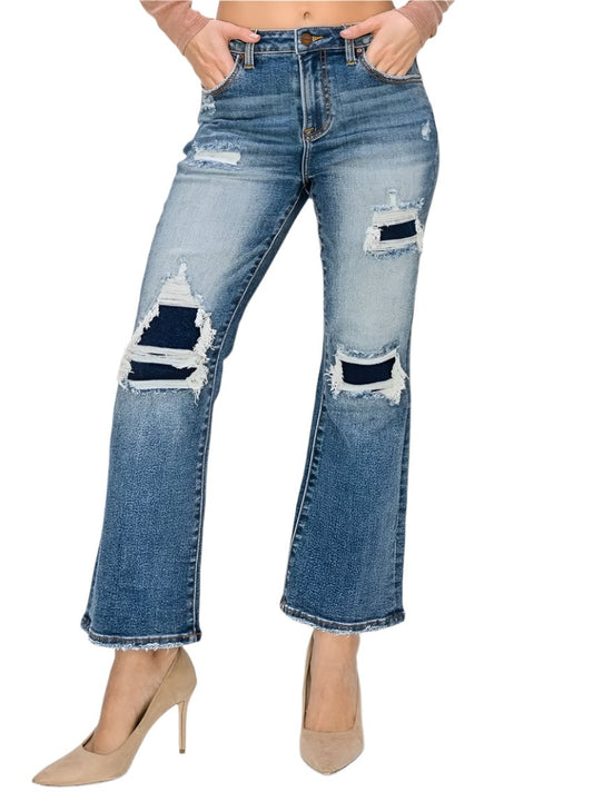 High-rise ankle flare jeans with trendy distressed patches and medium-wash denim
