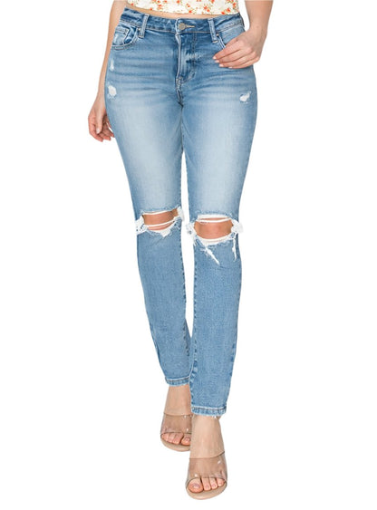 High-rise skinny jeans with distressed detailing at the knees in medium wash
