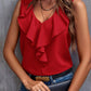 Bold red sleeveless blouse with eye-catching ruffle design, ideal for making a statement