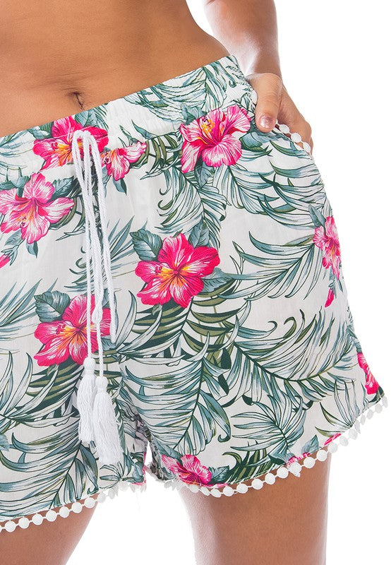 Bright and eye-catching high-waist shorts with tropical flowers, perfect for warm weather