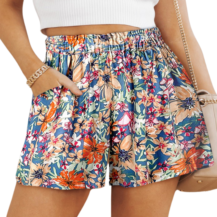 Stylish Floral High Waisted Shorts with pockets perfect for summer. Light fabric, vibrant colors, and versatile design for any occasion.