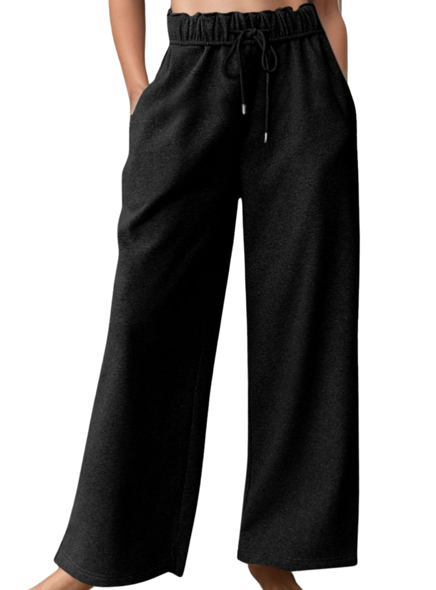 Relaxed fit black pants with an elastic waist and adjustable drawstring.