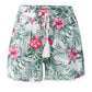 Detailed view of women's tropical print shorts with comfortable high-waist fit