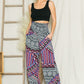 Colorful high-waisted pattern pants with elastic waistband