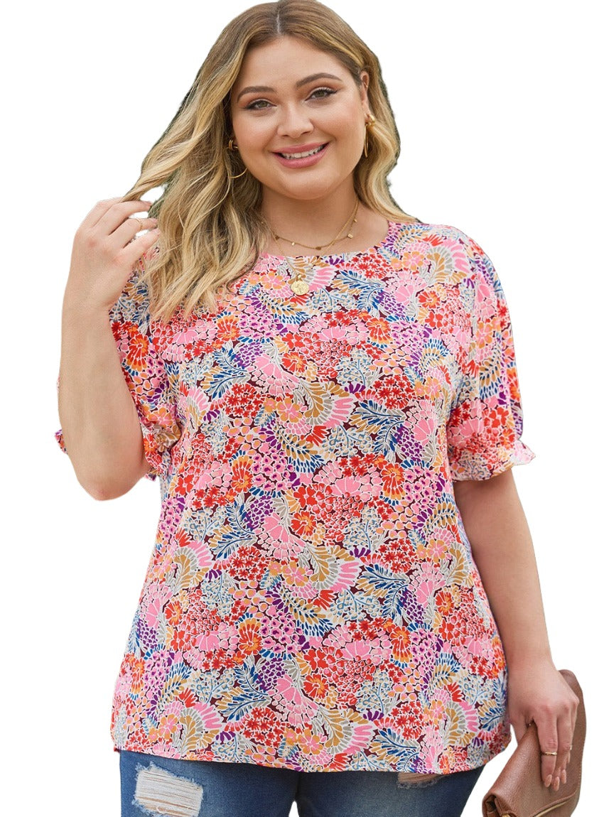 Model wearing a breathable and stylish floral print top, perfect for warm southern days