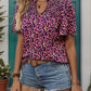 Eye-catching patterned top with smocked detailing, ideal for warm days and versatile outfit pairings