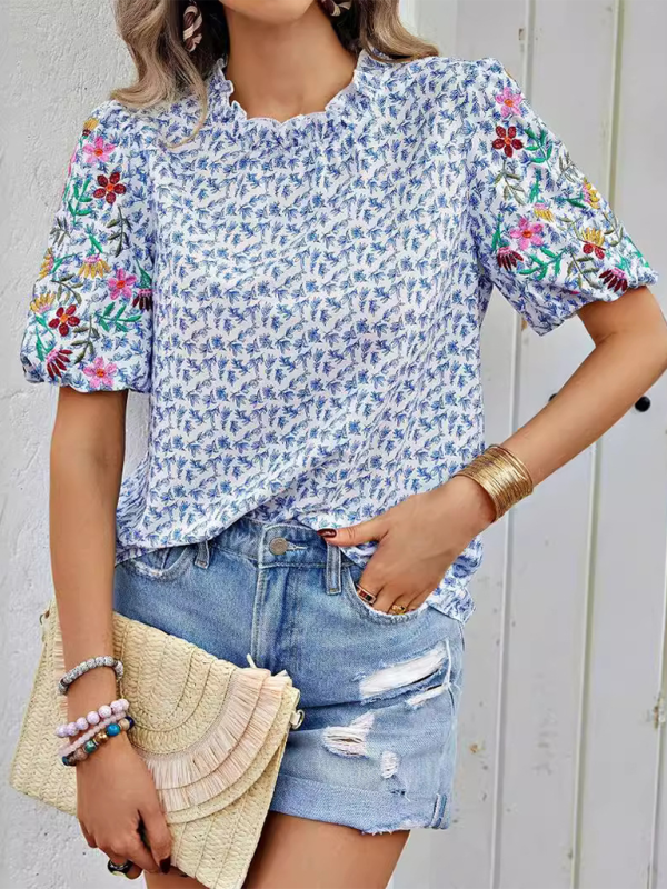 Embroidered shirt with vibrant floral embroidery on sleeves