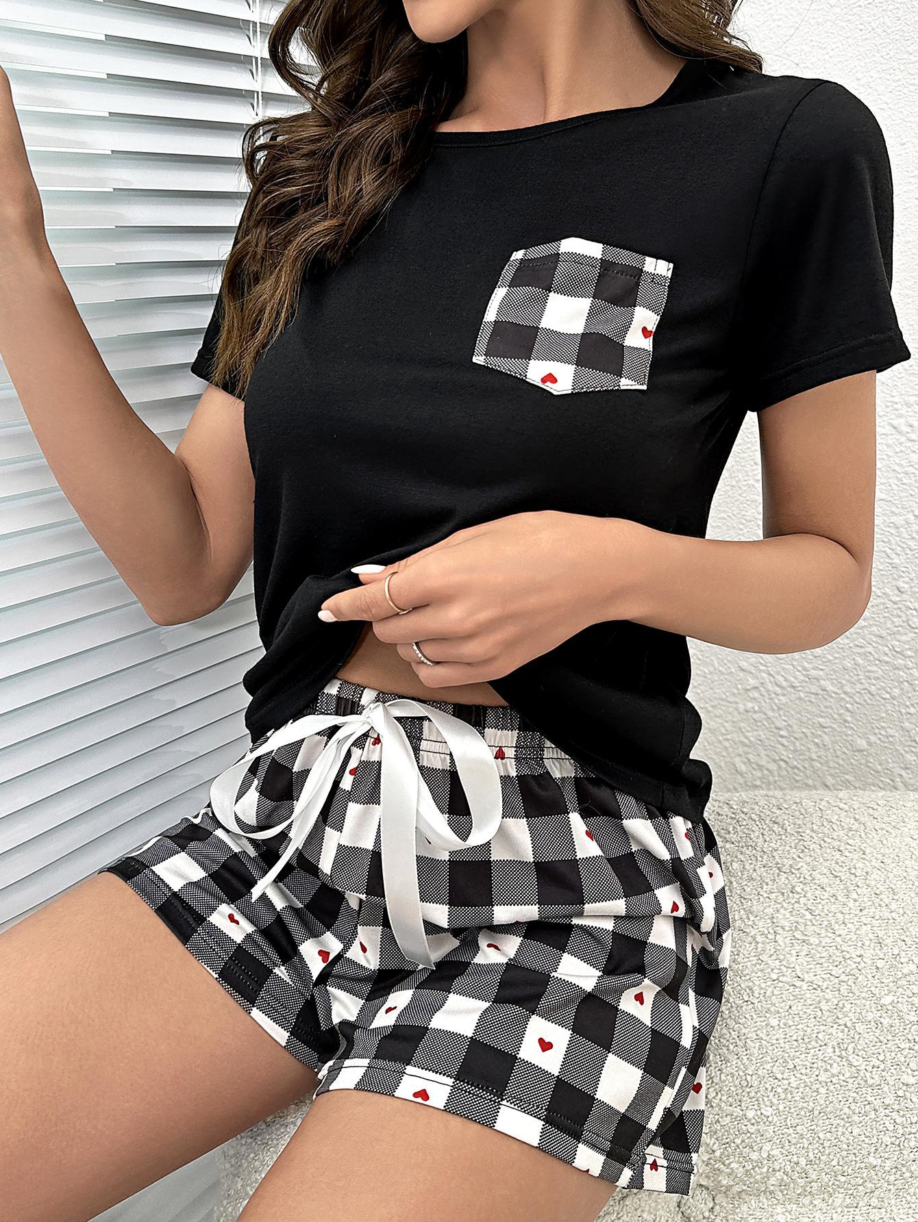 Upgrade your loungewear game with our Plaid Heart Top and Shorts Lounge Set. Comfort meets style for the modern woman. Shop now!