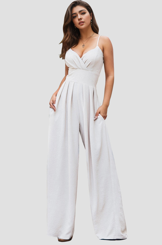Discover effortless elegance with our Spaghetti Strap Wide Leg Jumpsuit. Versatile, comfortable, and chic – the perfect addition to your wardrobe