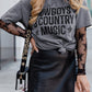 Gray graphic tee with "Cowboy & Country Music" text in bold black letters