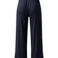 Women's wide-leg pants with an elastic waistband in various colors.