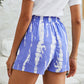 Stay comfy & stylish in our blue tie-dye drawstring shorts with pockets - perfect for summer days out or cozy weekends.