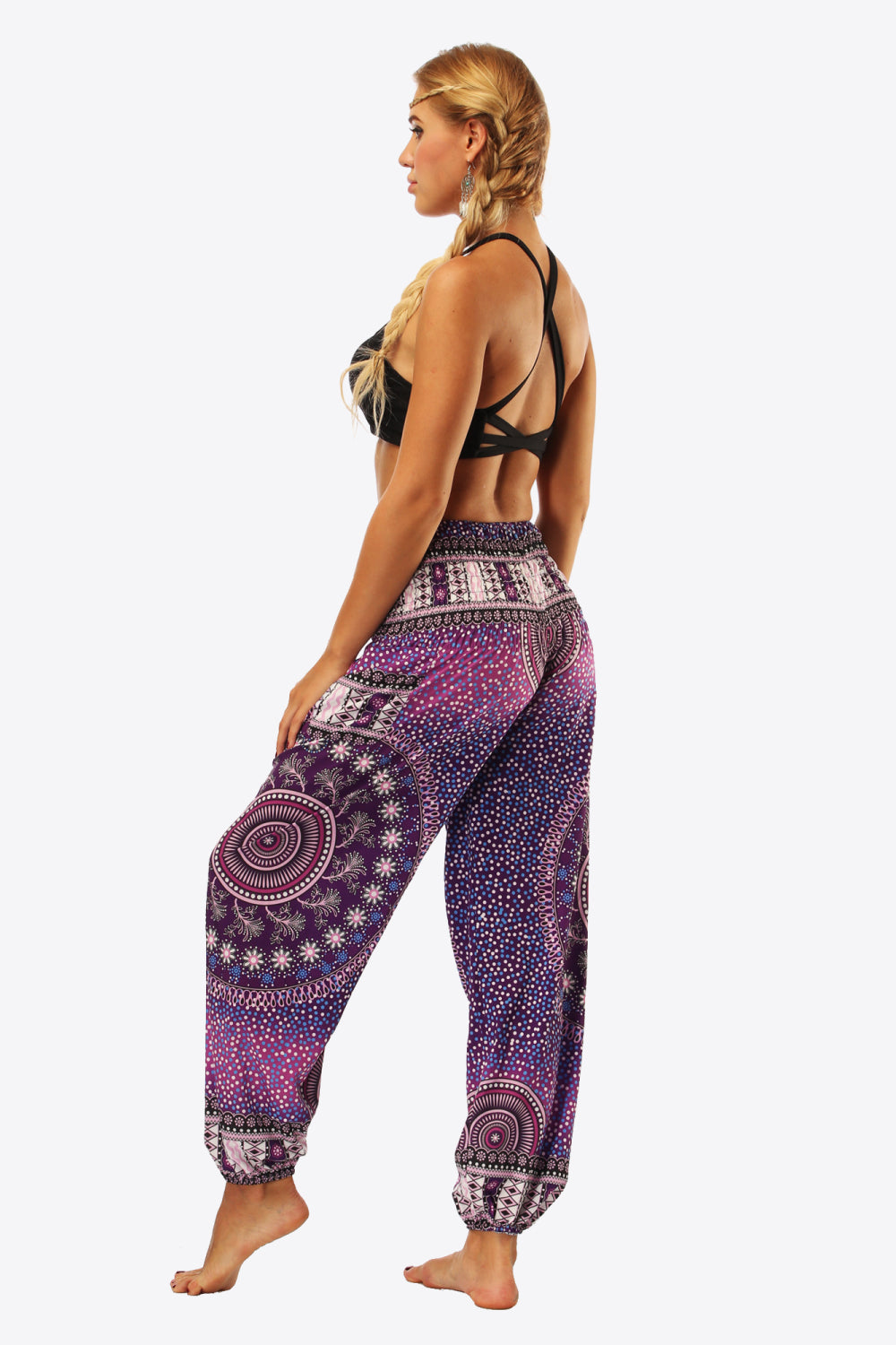Comfortable and colorful purple harem pants with detailed prints.