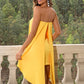 Embrace elegance with our Strapless Slit Layered Dress, perfect for any summer event. Stand out with its vibrant yellow and chic design.