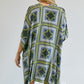 Geometric pattern kimono with tassels in shades of blue and green