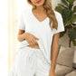 Luxe V-neck lounge set with drawstring shorts for ultimate comfort and style. Perfect for relaxation or casual outings. Easy care, chic design.