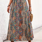 Vibrant paisley print maxi skirt with an elastic waistband.