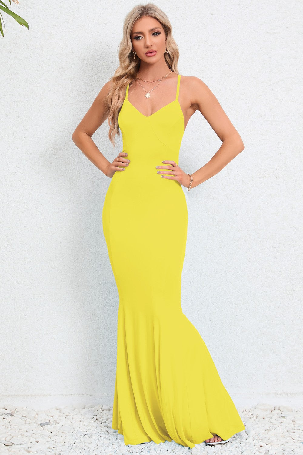 Dazzle in the Crisscross Fishtail Dress, available in sky blue and canary yellow for unforgettable elegance at any event.