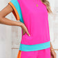 Bright pink and teal sporty short-sleeve top and shorts